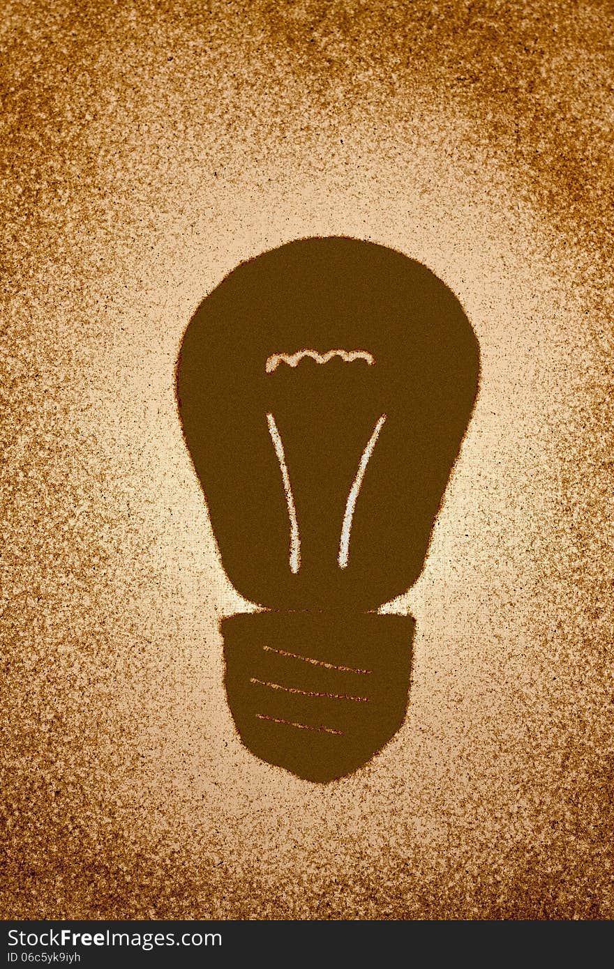 Light bulb drawn on the sand. Light bulb drawn on the sand