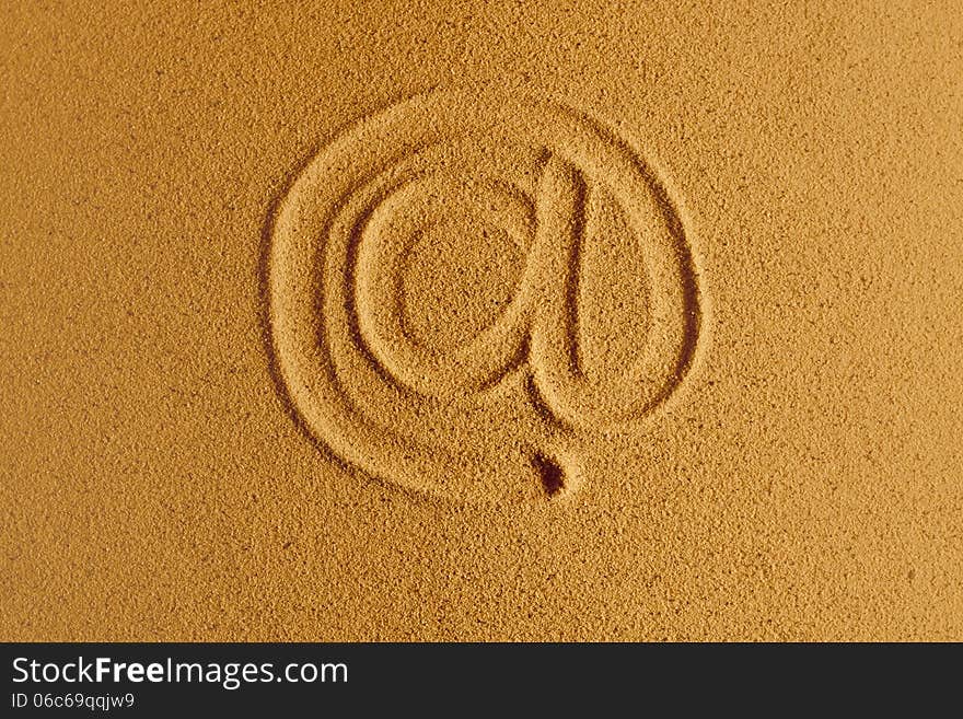 Email symbol drawn in the sand. Email symbol drawn in the sand