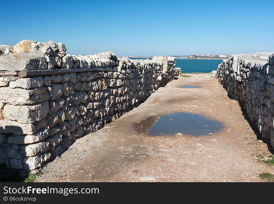 Crimea, Ukraine, Chersonese, the ruins of the ancient city, the old masonry, excavation, stone structure, ancient structures, culture. Crimea, Ukraine, Chersonese, the ruins of the ancient city, the old masonry, excavation, stone structure, ancient structures, culture