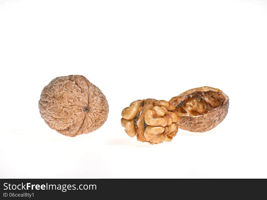 Walnuts on a white background.