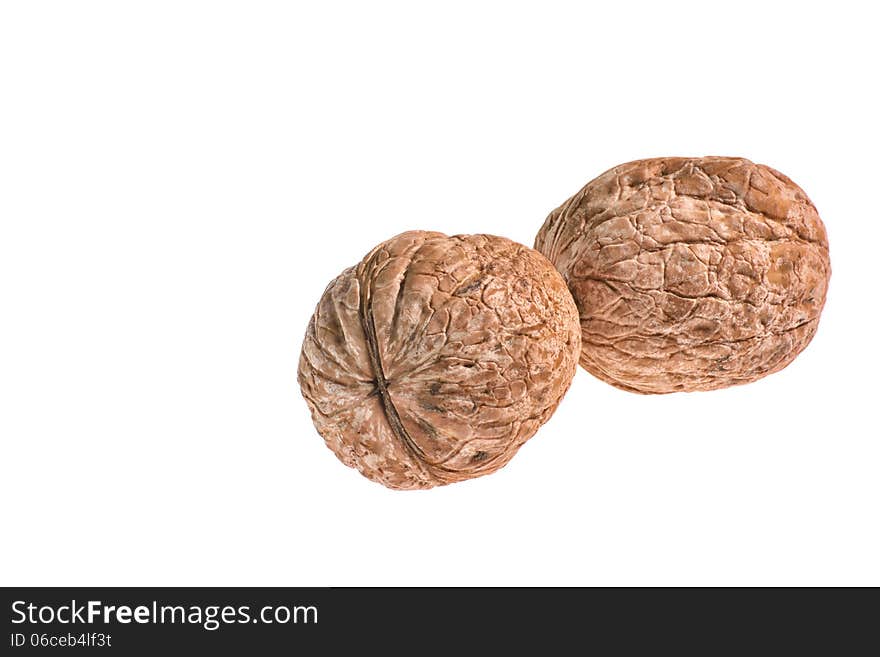 Walnuts on a white background.