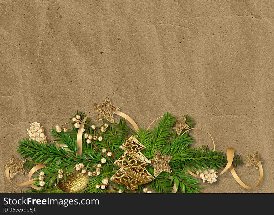 Christmas vintage cardboard background with fir branches and beautiful gold Christmas decorations. Christmas vintage cardboard background with fir branches and beautiful gold Christmas decorations