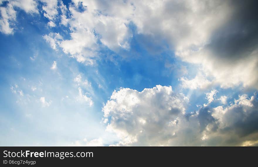 Sky with clouds and sun