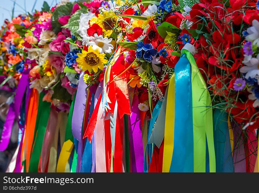 Wreath of flowers and ribbons, national cloths of Ukraine