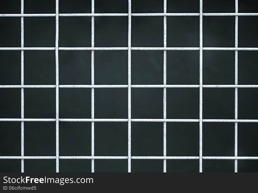 Iron lattice on a dark background