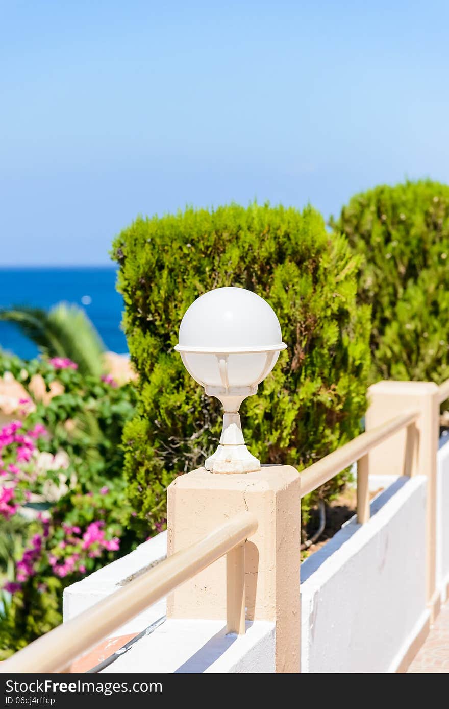 Small lantern in a garden on the ground. Small lantern in a garden on the ground