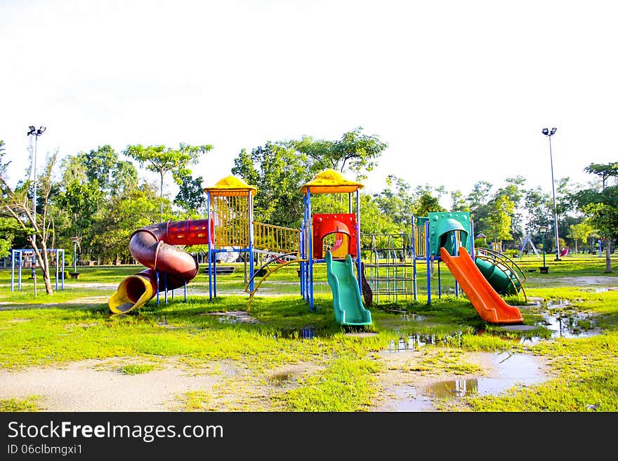 Playground park on grass near school is children