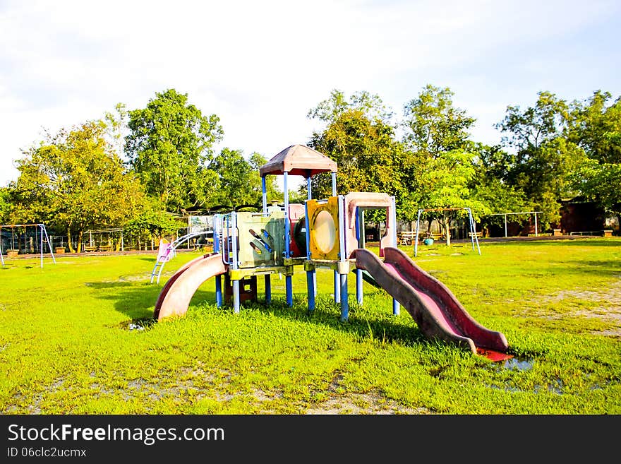 Playground park on grass near school is children