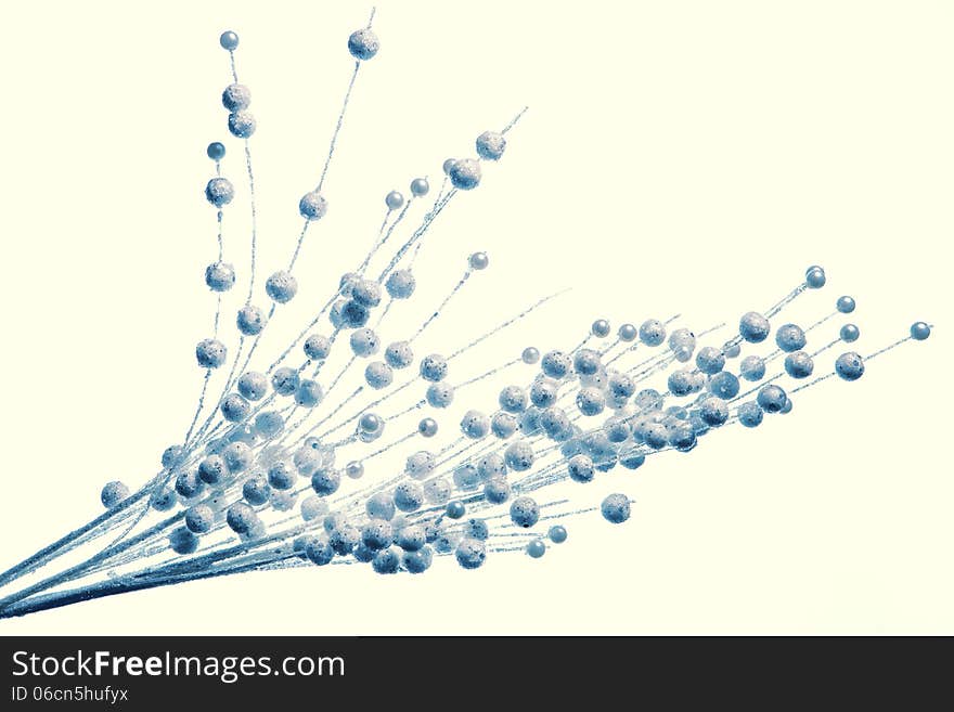 Holiday decoration- blue color twig with many small bubbles. Isolated over white background. Holiday decoration- blue color twig with many small bubbles. Isolated over white background.