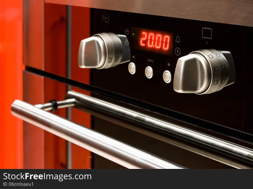 Modern electric oven with digital display and controls. Modern electric oven with digital display and controls