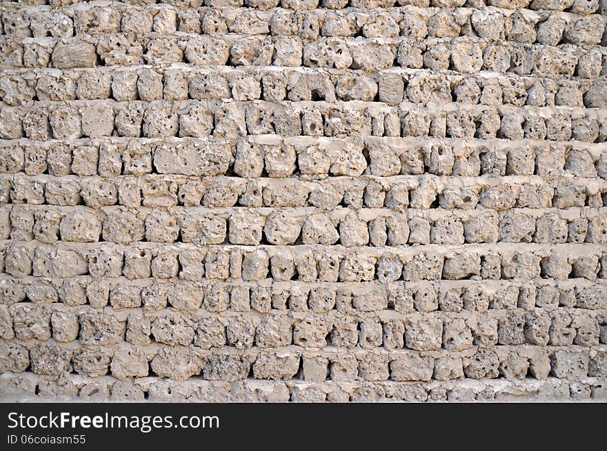 Old wall of fossilized seashells and corals. Old wall of fossilized seashells and corals.