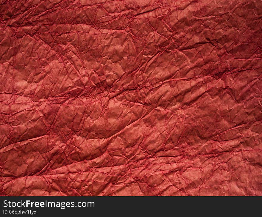 Red crumpled paper texture