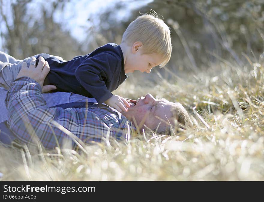 Dad And Son Playing Wrestling