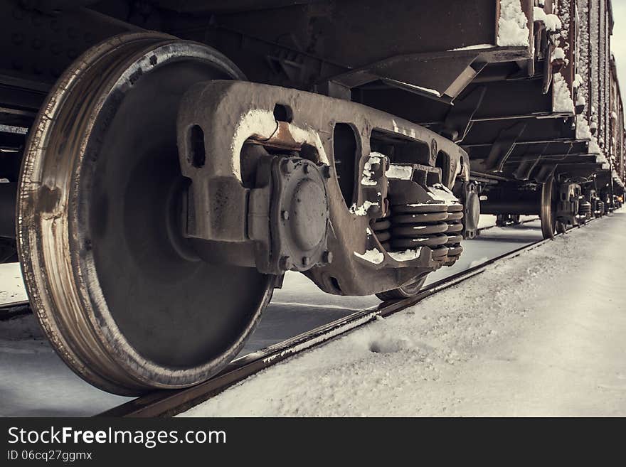 Train wheels on track in winter