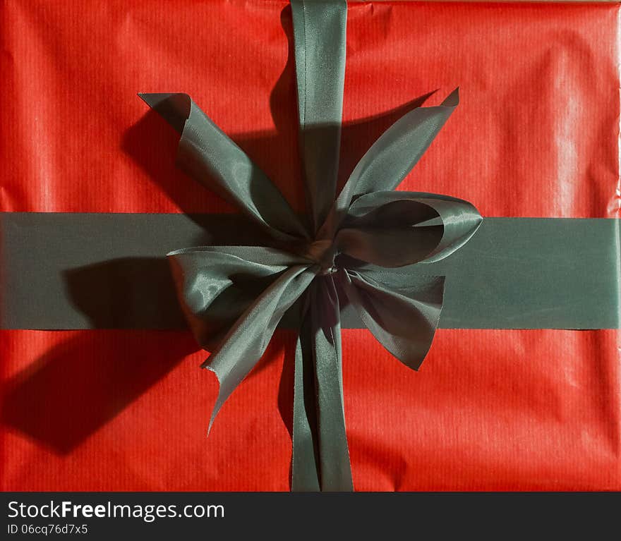 Red Present with Black Bow