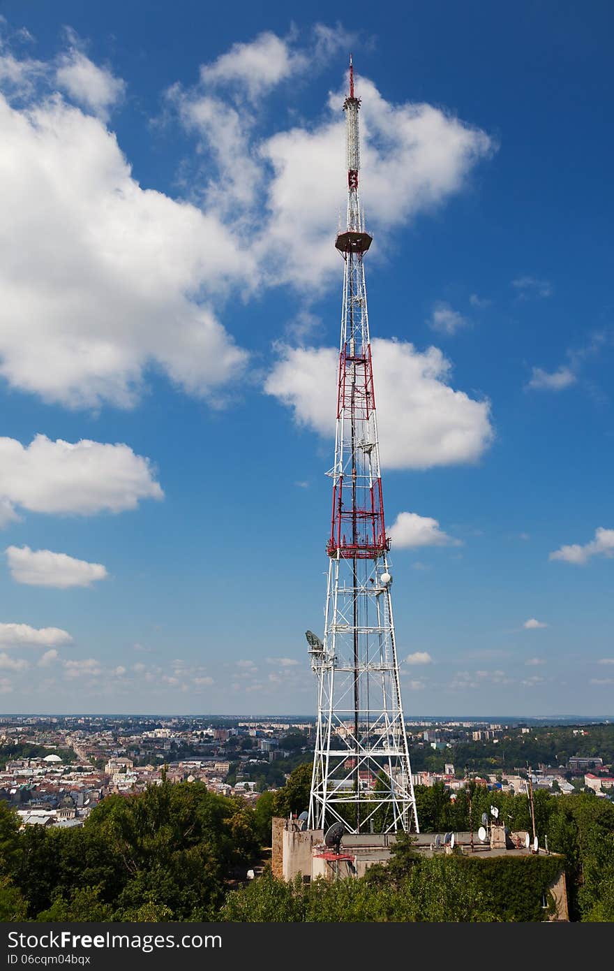 Telecommunication tower on blue sky background