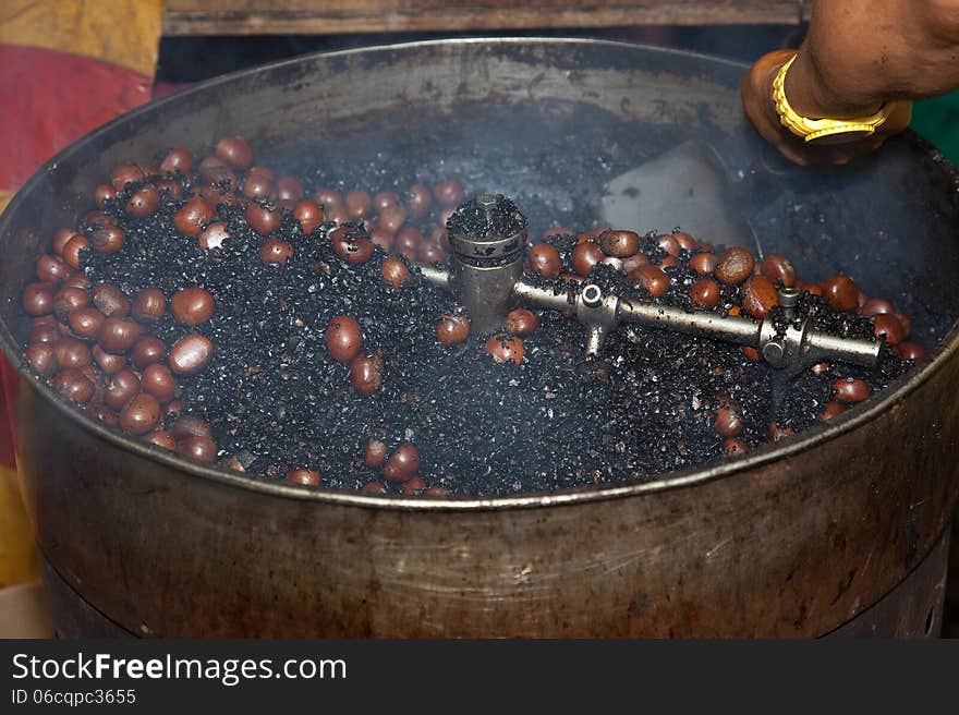 Roasting chestnuts Malaysia a street food