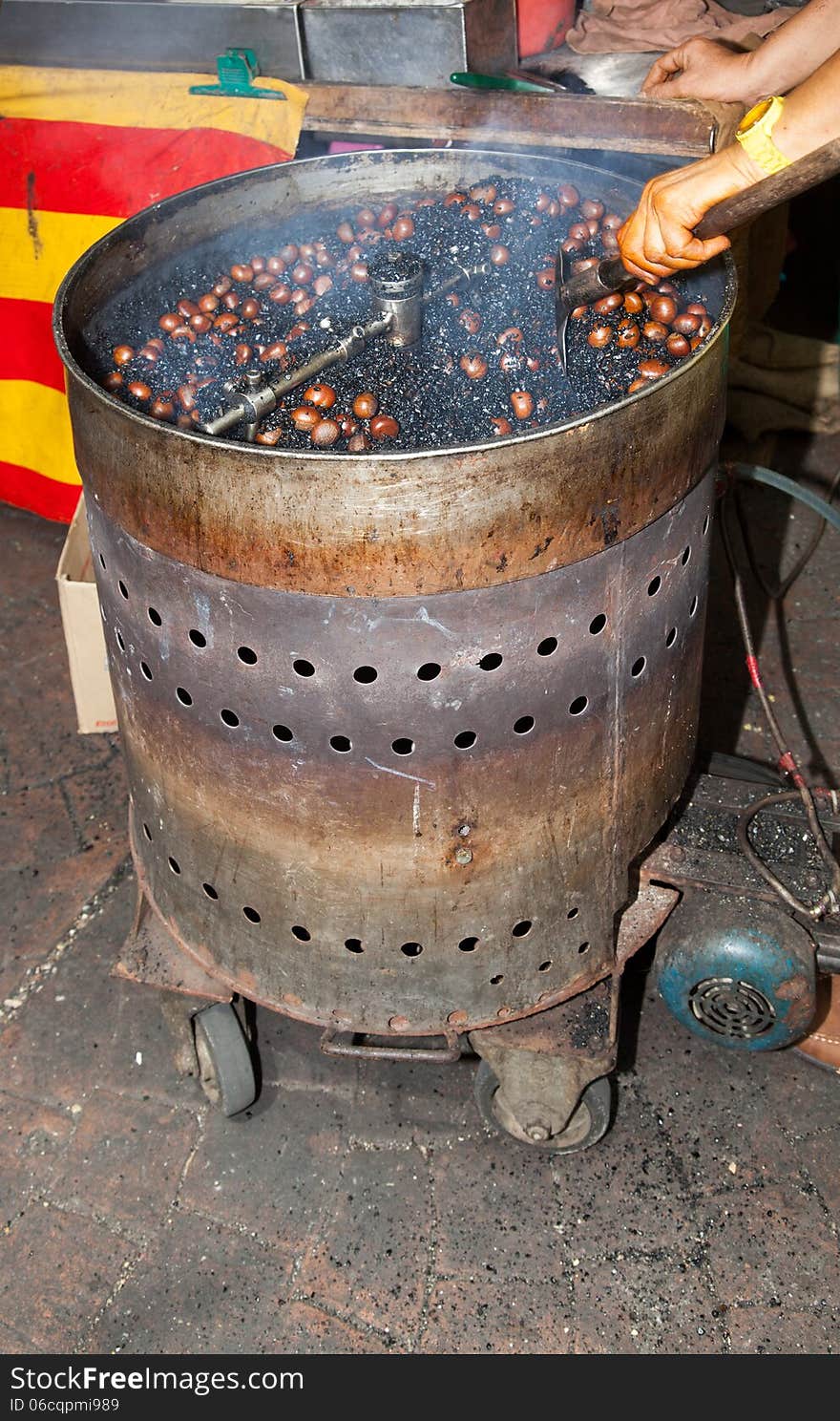 Roasting chestnuts Malaysia a street food