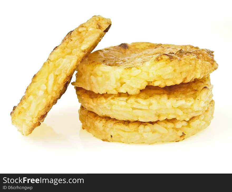 Triple stack of Kgawhie snack on white background. Kgawhie is thai street food. it made from sticky-rice and egg. cooking by grilling. Triple stack of Kgawhie snack on white background. Kgawhie is thai street food. it made from sticky-rice and egg. cooking by grilling.