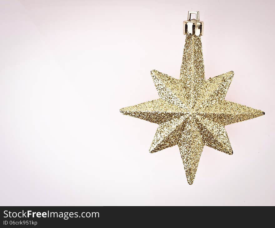 Ornament gold star on white background with vignett conner and copy space. Ornament gold star on white background with vignett conner and copy space