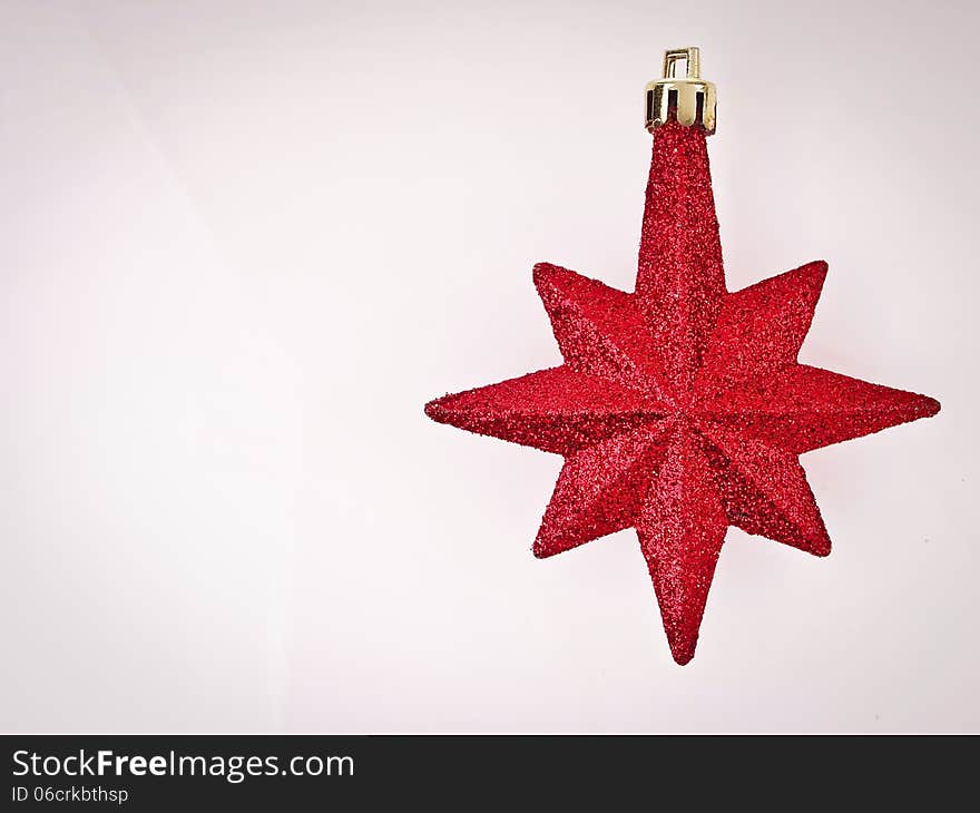 Ornament red star on white background with vignett conner and copy space. Ornament red star on white background with vignett conner and copy space