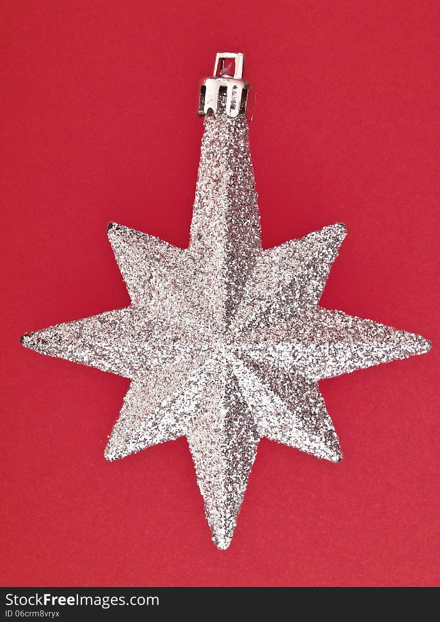 Ornament star on red