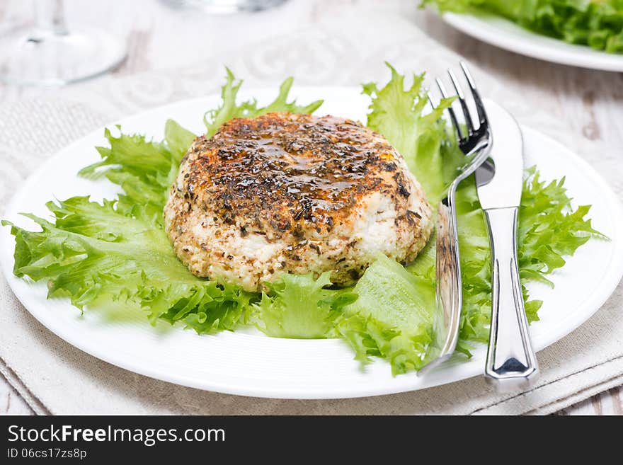 Baked homemade cheese on the plate