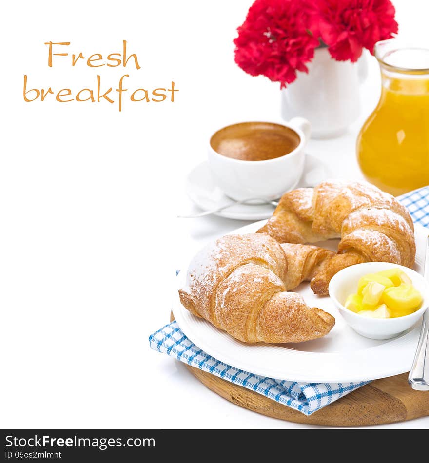 Breakfast - croissants with butter, espresso and orange juice