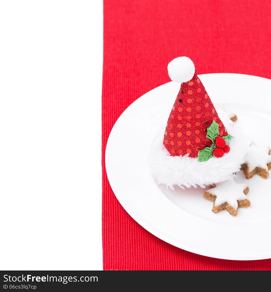 Christmas Table Setting With Red Cap And Cookies, Isolated