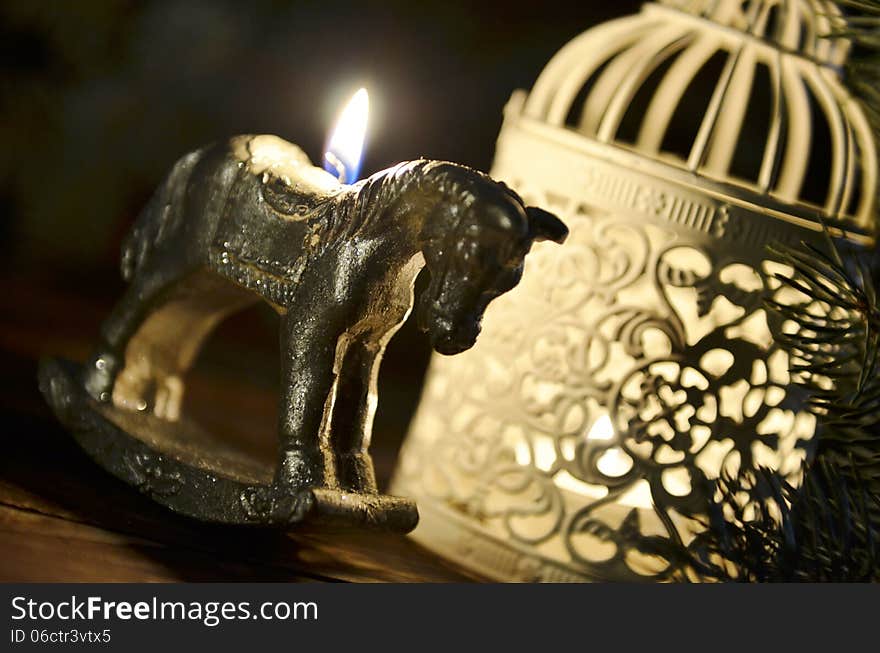 New Year`s candle in the form of a horse