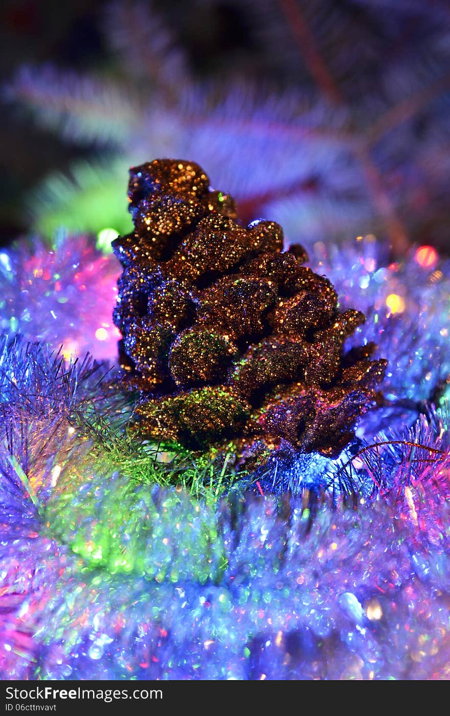 New Year`s composition of a pine cones and tinsel