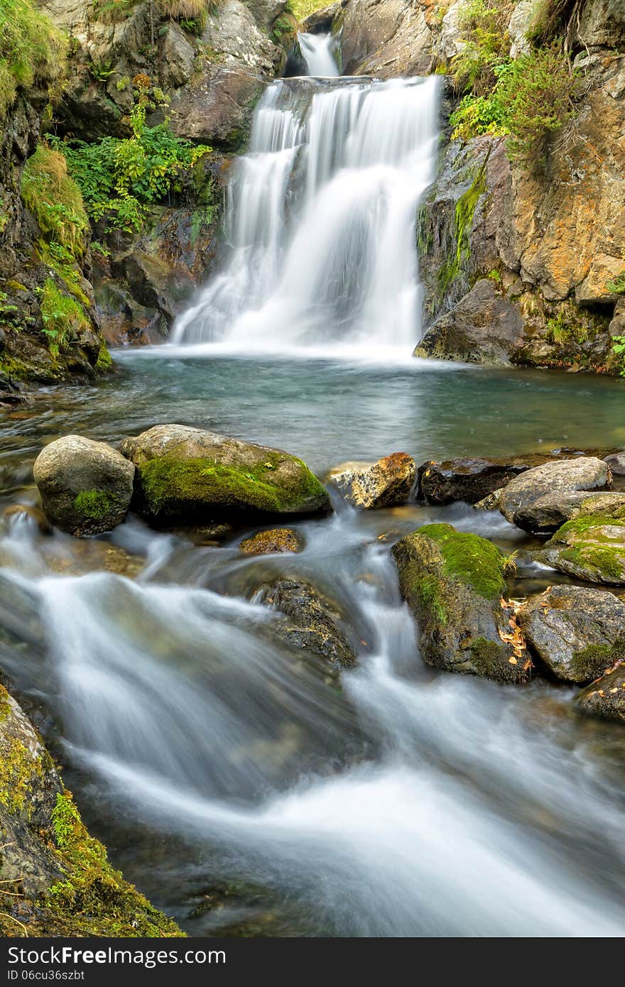 Beautiful veil cascading waterfalls, mossy rocks