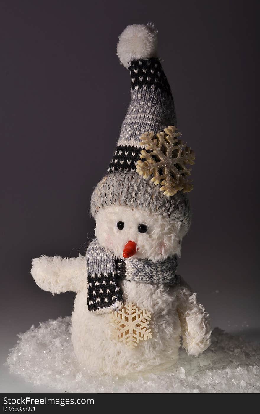 New Year`s composition of a snowman and snow. New Year`s composition of a snowman and snow