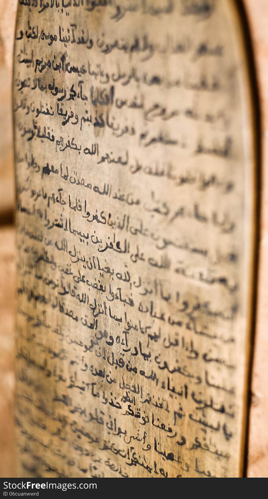 A Koran written on a board with shallow depth of field. A Koran written on a board with shallow depth of field