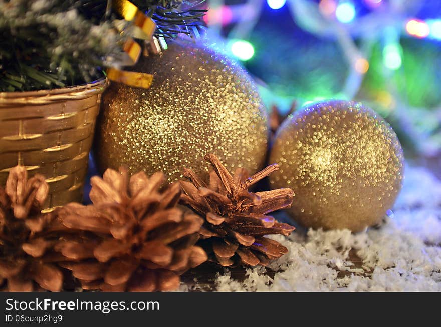 Composition of colorful Christmas balls, cones and Christmas lights. Composition of colorful Christmas balls, cones and Christmas lights