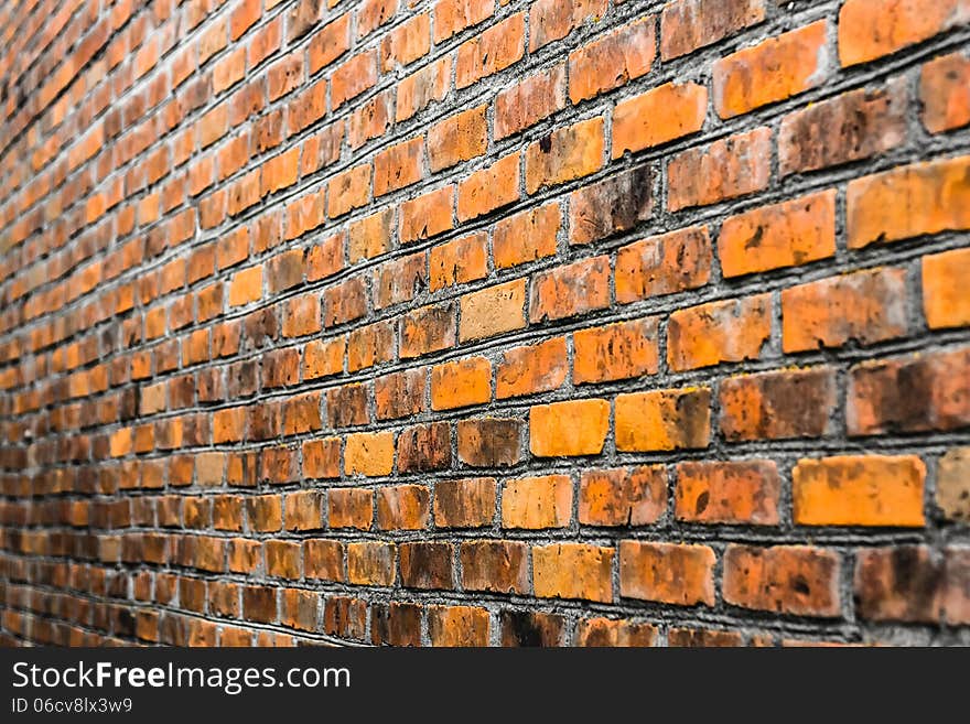 Perspective Of A Dirty Red Brick Wall. Selective Focus. Perspective Of A Dirty Red Brick Wall. Selective Focus