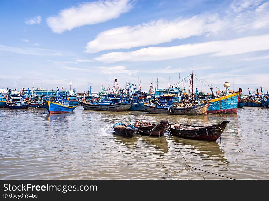 Fishing boats moored in fishing port.