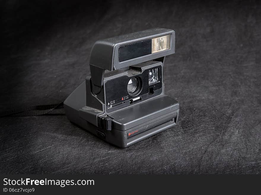 Creating instant photo camera on a black background