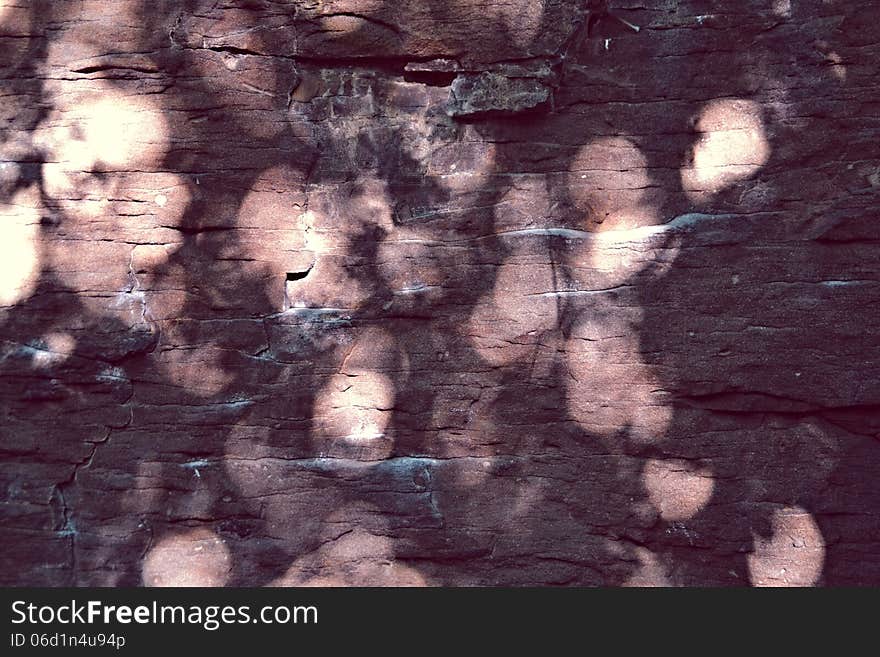 Sandstone rocks with reflections of sunlight circular form. Sandstone rocks with reflections of sunlight circular form