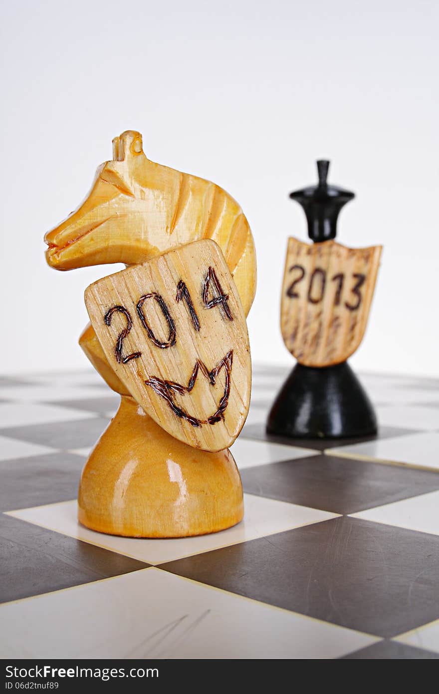 New Year chess abstract concept. Knight as a symbol 2014 year. New Year chess abstract concept. Knight as a symbol 2014 year