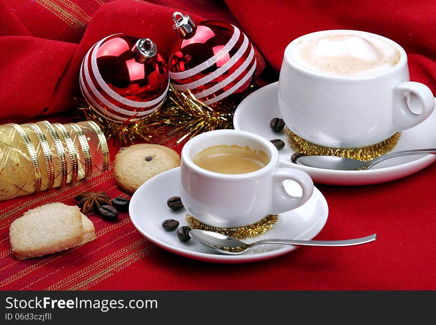 Milk and coffee with espresso on background of red cloth and pastries. Milk and coffee with espresso on background of red cloth and pastries