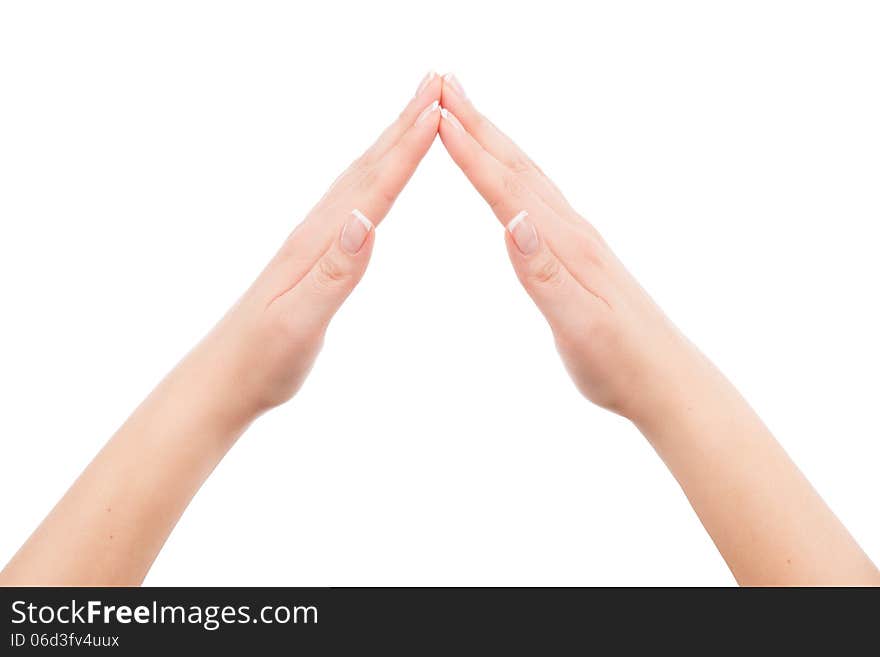 Woman hands showing home symbol gesture, isolated on white background. You can put any image or symbol between hands.