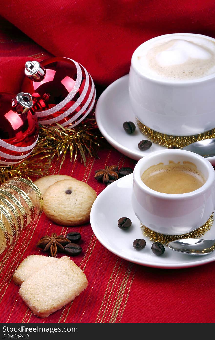 Milk and coffee with espresso on background of red cloth and pastries. Milk and coffee with espresso on background of red cloth and pastries