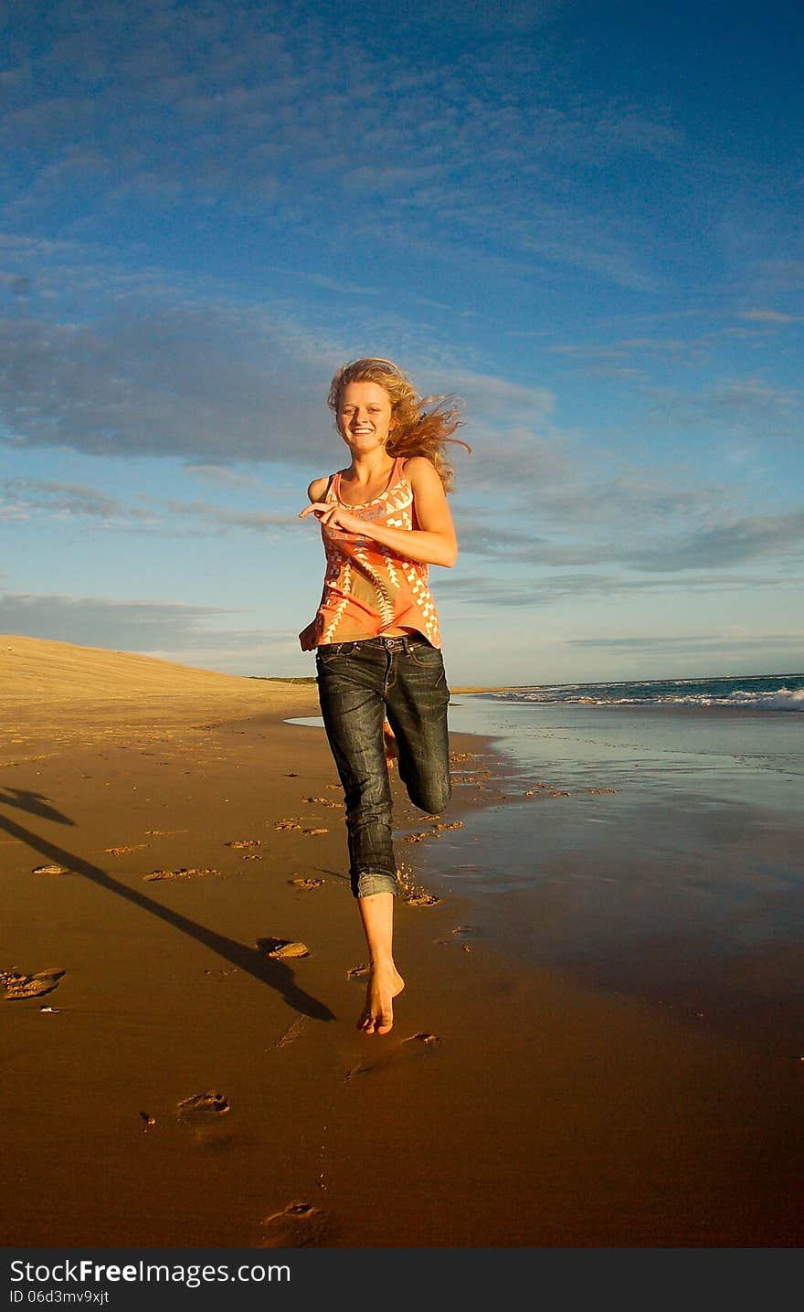 Girl running on beach