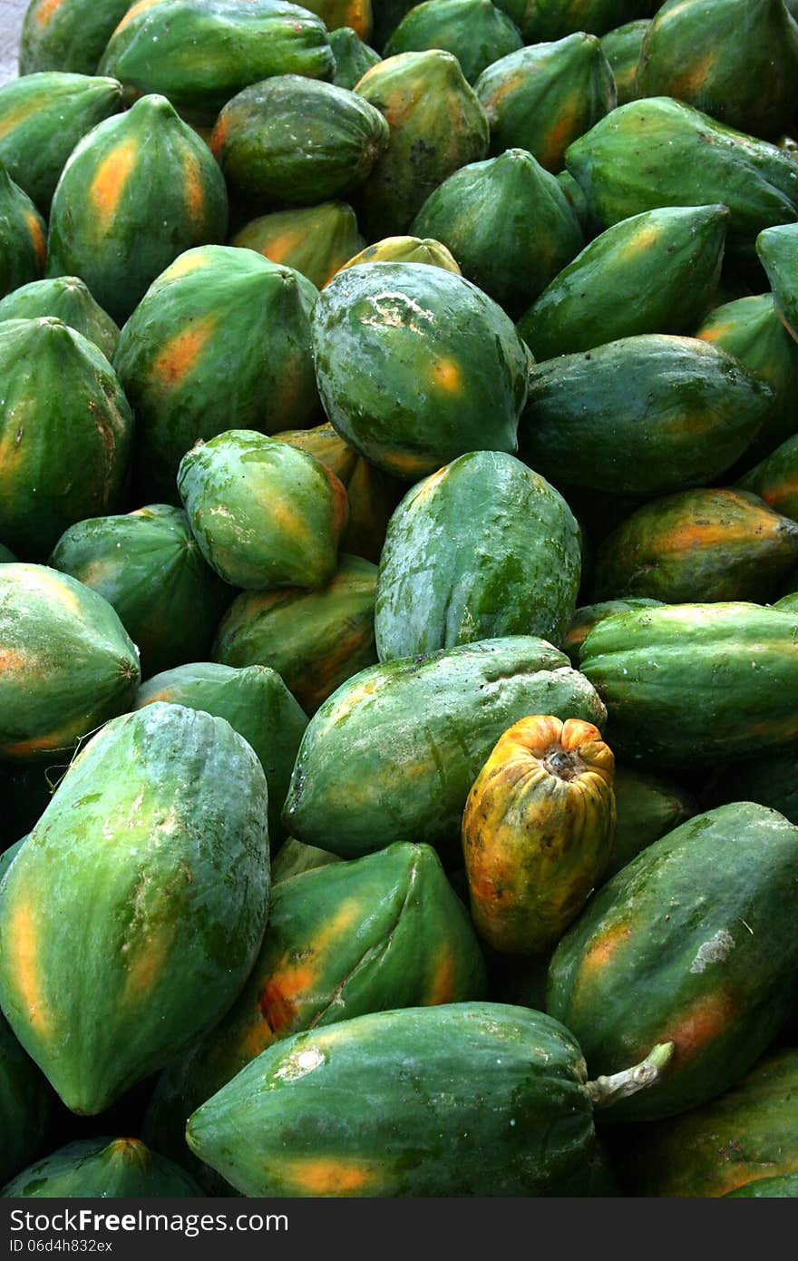 unfresh papaya in traditional market, asia