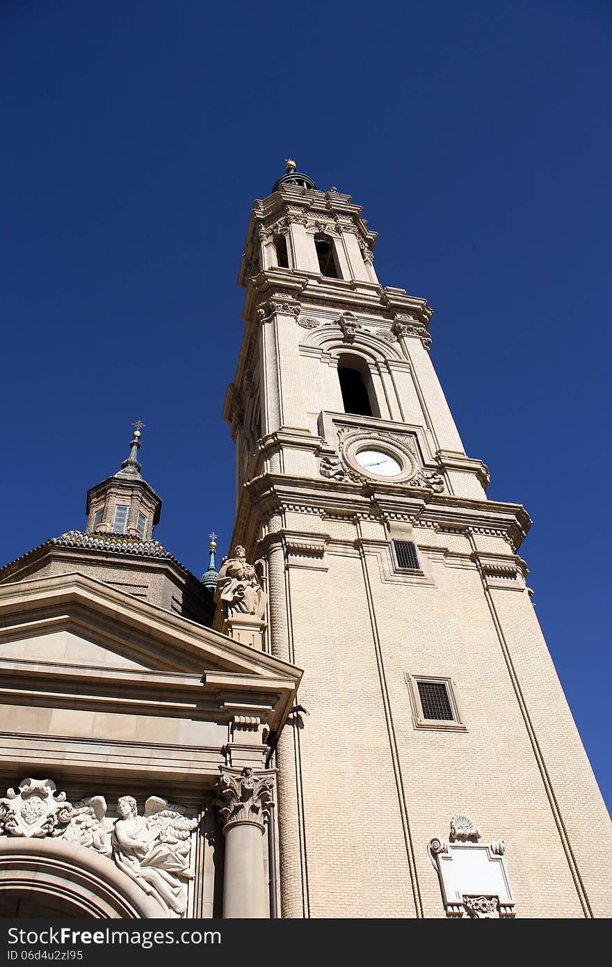 Closeup of famous Saragossa cathedral belfry against blue sky. Closeup of famous Saragossa cathedral belfry against blue sky