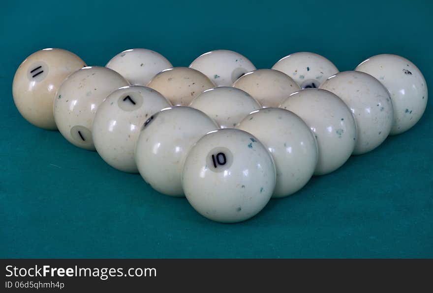 White balls forf Russian billiards on green