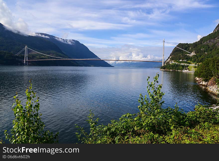 The longest suspension bridge in Norway, 1380 metres crossing the Hardanger Fjord in western Norway. The longest suspension bridge in Norway, 1380 metres crossing the Hardanger Fjord in western Norway