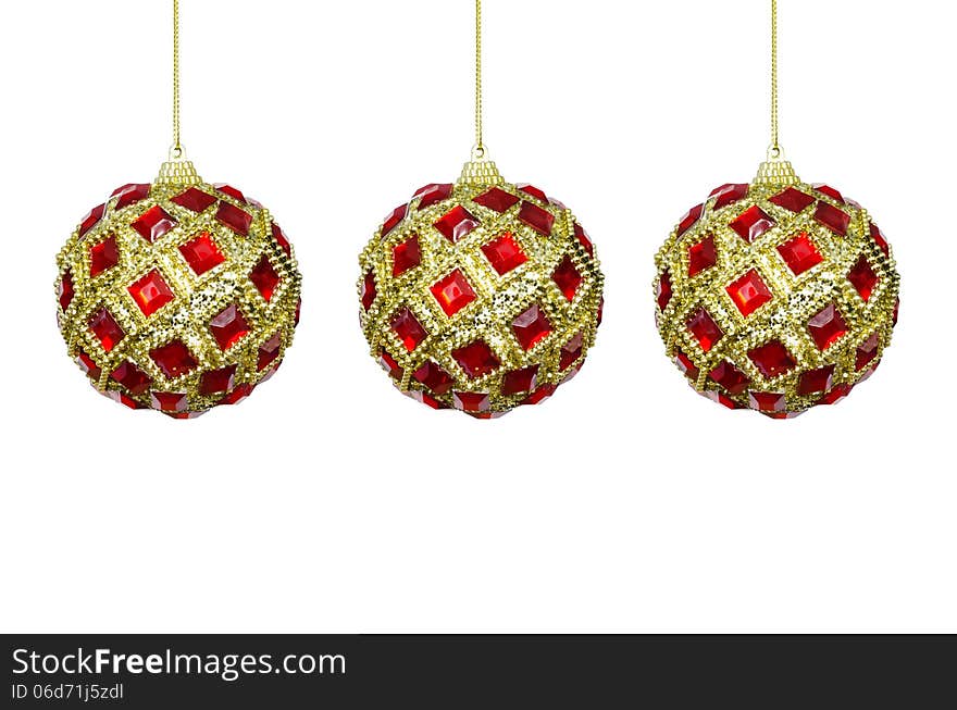 Toys for the Christmas tree, three red-yellow sphere on a white background. Toys for the Christmas tree, three red-yellow sphere on a white background