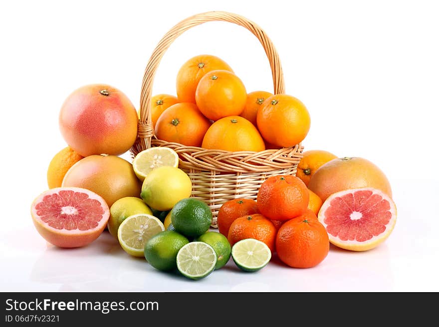 Mixed citrus fruit in wicker basket